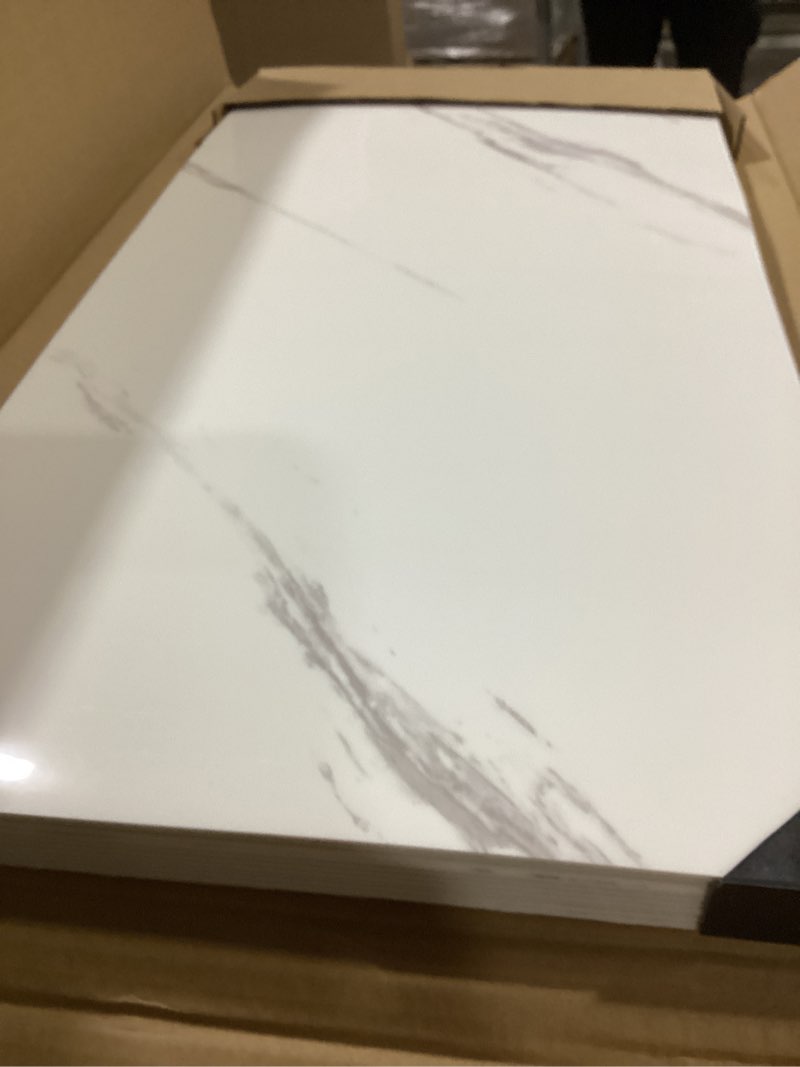 Condition photo showing As Is for Haimin Wall Panels Peel and Stick 10 Pieces 23.6x11.8in (19.4 Sq. Ft. Coverage) Lightweight Backsplash Marble Look Tile (not Real Marble) Ideal for Kitchen Bathrooms Living Rooms Bedrooms (White-JSB)