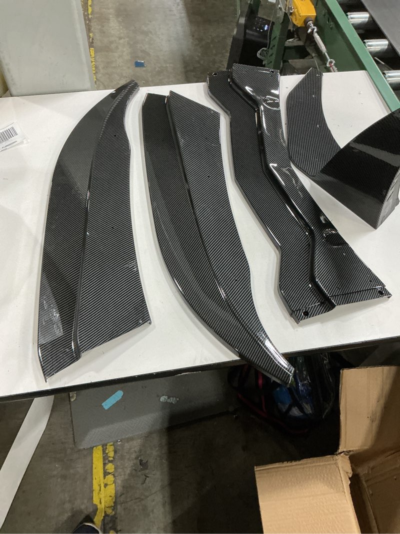 Condition photo showing Good Condition for automotive exterior accessories, specifically car rear bumper lip winglets, side skirt splitters, or canards featuring a carbon fiber texture finish (similar to stock photo)(for unknown make and model)