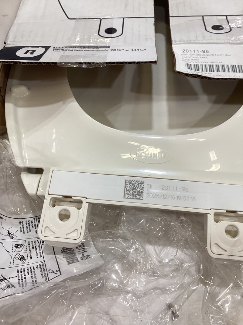 Condition photo showing As Is for kohler 20111-96 brevia, slow close toilet seat, round toilet seat, grip-tight bumpers quick-attach hardware, biscuit biscuit round quiet-close