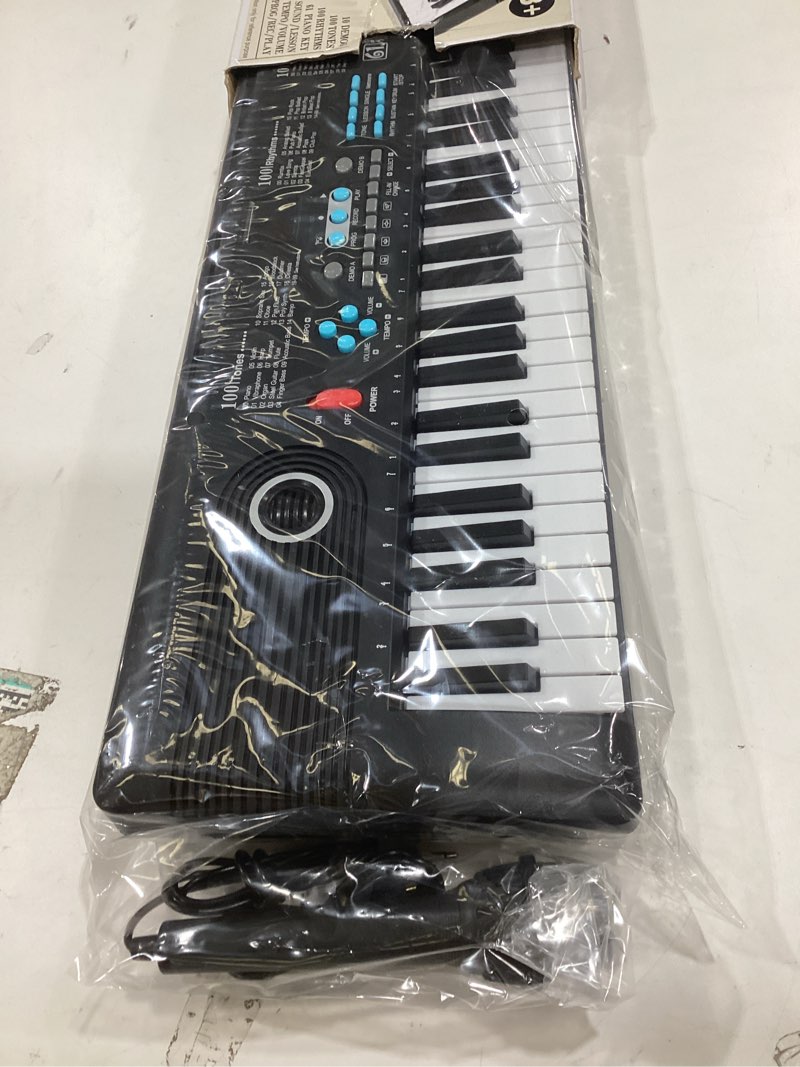 Condition photo showing New/Like New for 61 keys keyboard piano, electronic digital piano with built-in speaker microphone, portable keyboard gift teaching for beginners, electric piano for kids black