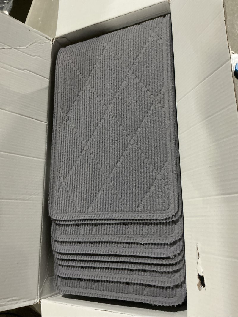 Condition photo showing Good Condition for stair treads for wooden steps indoor, kooteta 15 pack 8" x 30" non slip carpet stair treads with reusable adhesive for kids elders and dogs, surface polyester tpr backing stair rugs, grey 8" x 30" grey 15