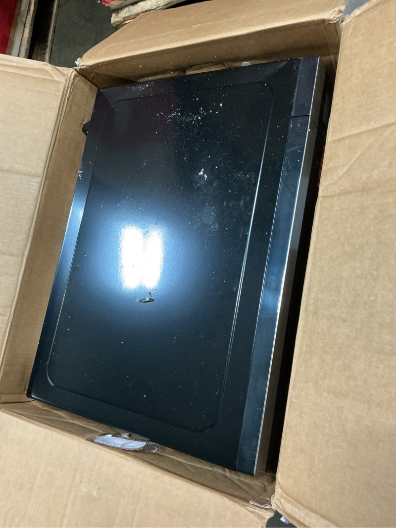 Condition photo showing As Is for Frigidaire 2.2 cu ft Microwave