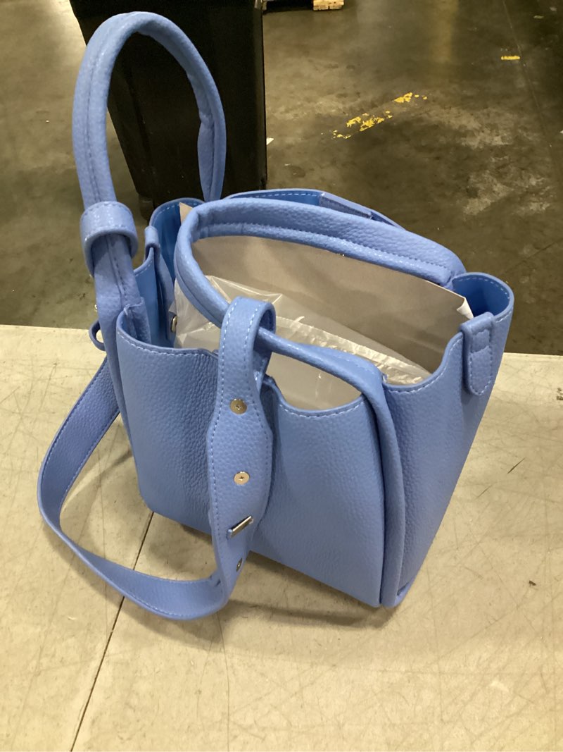 Condition photo showing New/Like New for mini crossbody purse - small faux leather bucket bag for women with zipper top handle adjustable strap gentian blue