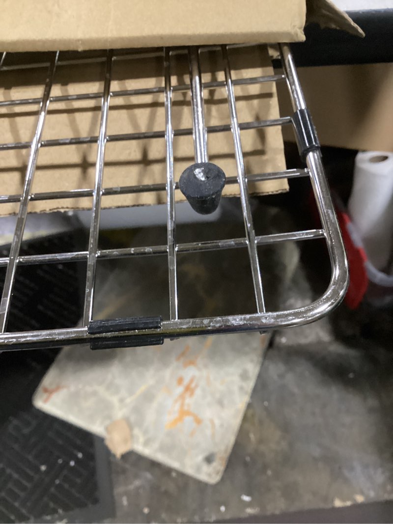 Condition photo showing As Is for sink grid 18" x 12-1/2", centered drain with corner radius 1-1/2" (18" x 12-1/2" centered drain)