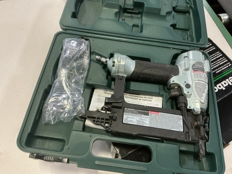 Condition photo showing As Is for Metabo HPT Brad Nailer, Pro-Preferred Lightweight Pneumatic Power Nailer for Precision Trim Work and Furniture Building, Adjustable Depth, 18 Gauge, 5/8" up to 2" Brad Nails, NT50AE2 Loveseat 18 GA Brad Nailer, Pneumatic