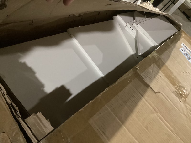 Condition photo showing As Is for IOTXY Small Narrow Corner Bookcase - 71 Inches Tall Gap Freestanding Storage Cabinet, 8 Lattices Open Shelves Tower Rack, Cubes Bookshelf in White 8-Cubes White