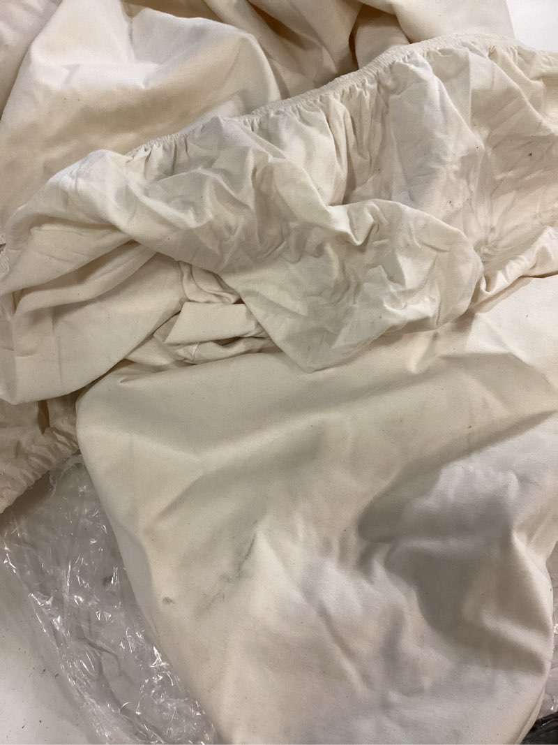 Condition photo showing As Is for fitted sheet ivory queen