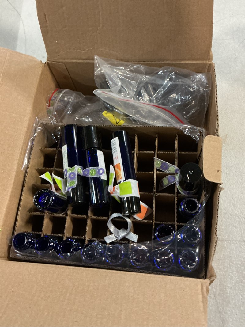Condition photo showing As Is for ulg essential oil roller bottles 48 pack 10ml cobalt blue glass empty bottles with stainless steel roller balls (10 extra roller balls, 4 openers, 4 droppers, 48 waterproof labels) blue 48-pack