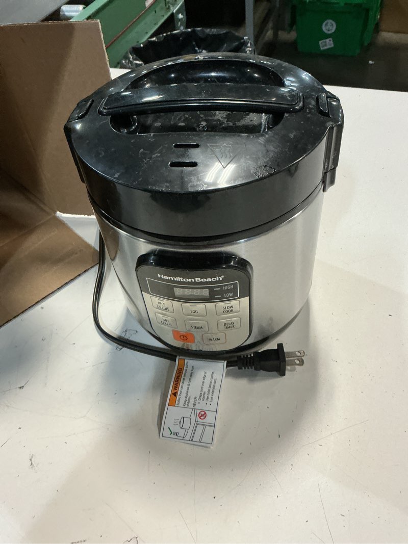 Condition photo showing As Is for hamilton beach digital programmable rice cooker & food steamer, with slow hard-boiled egg functions, egg/steam tray, small & compact, 6 cups cooked (3 uncooked), stainless steel (37524) stainless steel 6 cups cooked (3 uncooked)