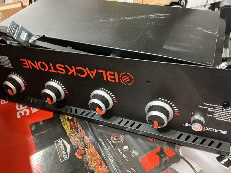 Condition photo showing As Is for blackstone original 4-burner 36" propane omnivore griddle with hard cover  