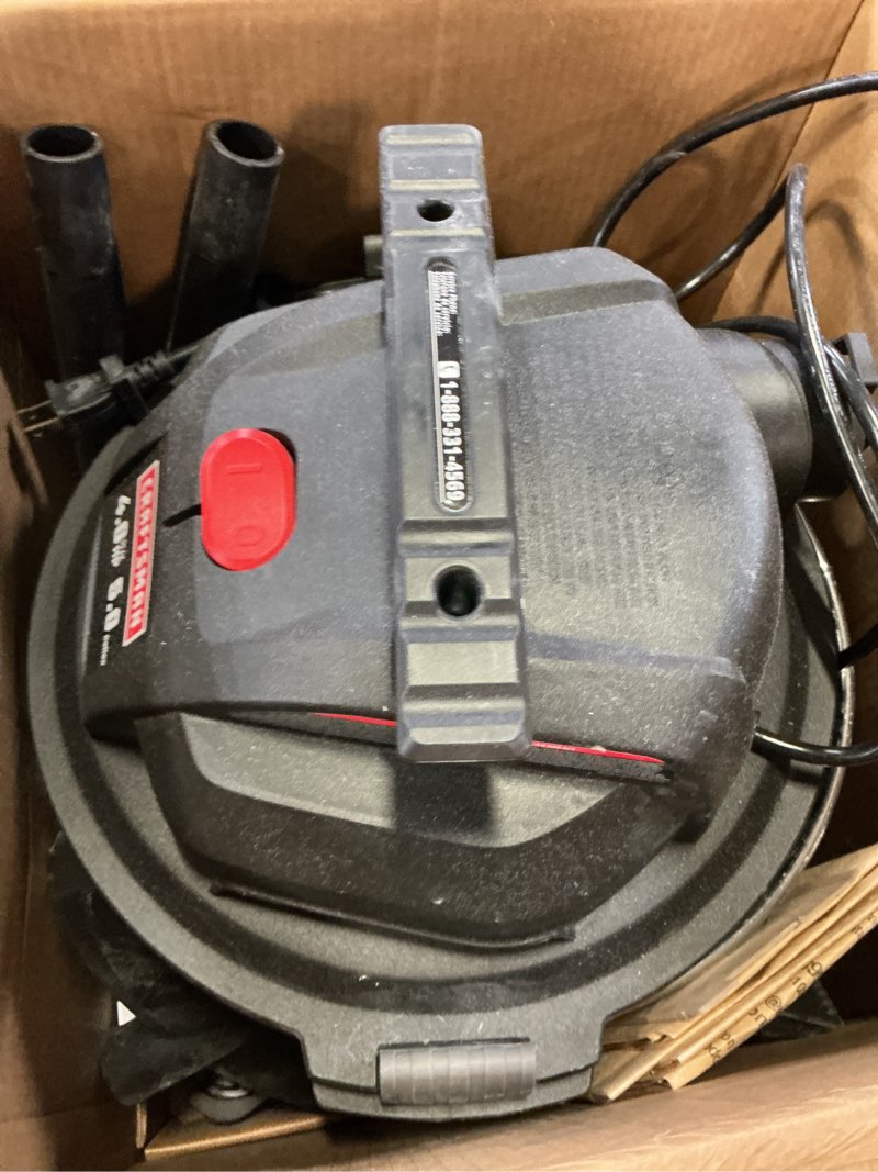 Condition photo showing As Is for craftsman 5-gallon 4-hp corded wet/dry shop vacuum with accessories included