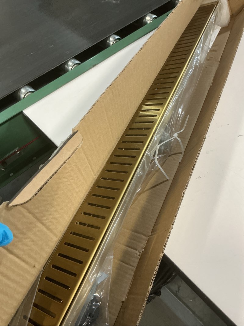 Condition photo showing Good Condition for Gold Shower Drain, 304 Stainless Steel Linear Shower Drain 36 Inch with Removable Capsule Pattern Grate - Adjustable Rectangular Brushed Shower Floor Drain with Hair Strainer, Linear Drains Brushed Gold 36 inch