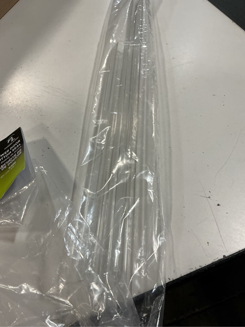 Condition photo showing Good Condition for prime-line m 6256 frameless shower door bottom seal for 1/4 in. thick glass doors, dual flap and 45 degree drip guard, 36 in., clear vinyl (single pack) clear 1/4 in. dual flap
