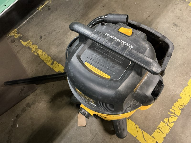 Condition photo showing As Is for dewalt stealthsonic quiet 9-gallon 5 hp corded wet/dry shop vacuum 