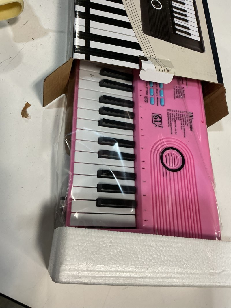Condition photo showing New/Like New for Keyboard Piano 61 Key Electric Digital Piano Music keyboard w/Microphone Portable Piano For Kids Beginner Birthday Christmas Gifts Pink pink 61 key piano