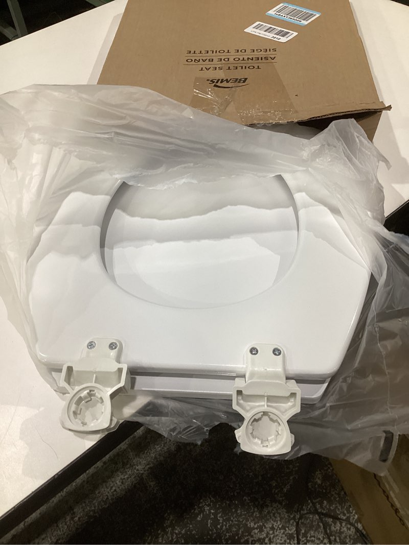 Condition photo showing Good Condition for bemis round enameled wood toilet seat in cotton white with easy•clean hinge