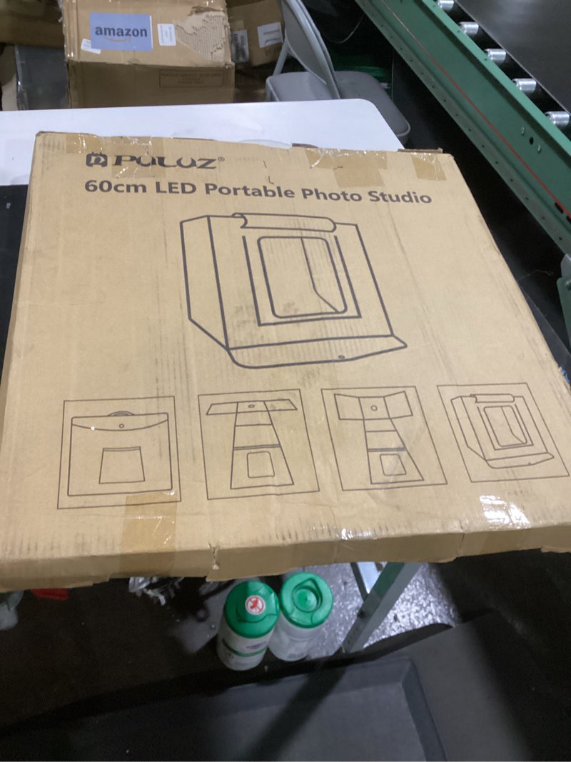 Condition photo showing As Is for photo box, puluz 24"x24" photo studio light box for photography portable large lightbox photo booth kit with 6 colors photo backdrops-dimmable 120pcs led beads, 5500k lighting, us plug