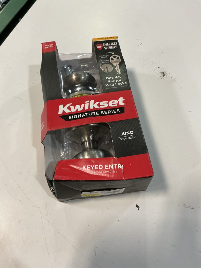 Condition photo showing As Is for kwikset smartkey juno satin nickel entry door knob kw1 1-3/4 in.