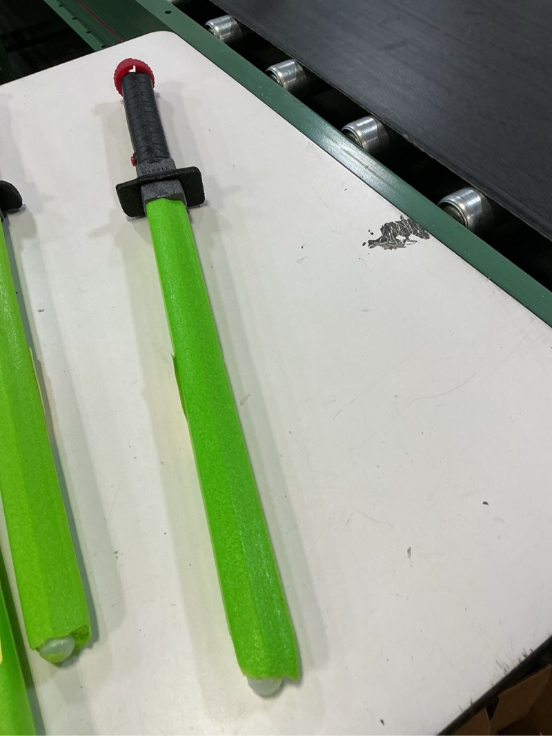 Condition photo showing As Is for (the color is green)adventure force light-up foam sword, soft foam construction with handle connector to combine two into one, lights up with batteries included, ages 4+