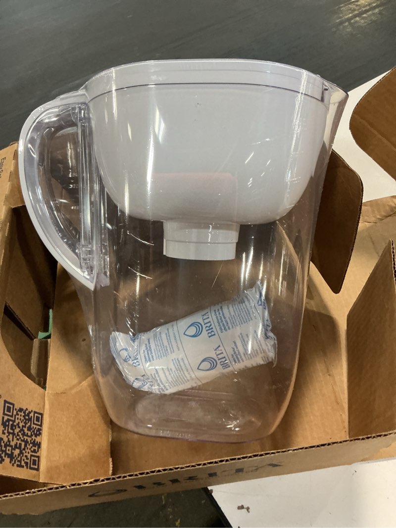 Condition photo showing New/Like New for brita large water filter pitcher for tap and drinking water, includes 1 standard filter, bpa-free, lasts two months, 10-cup capacity, bright white standard white