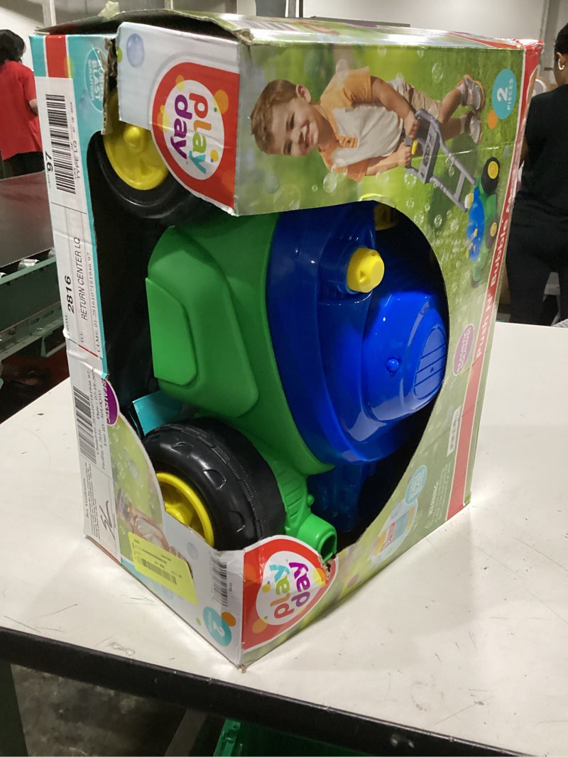 Condition photo showing New/Like New for play day bubble mower, includes 4 fl oz solution for children ages 3 and up