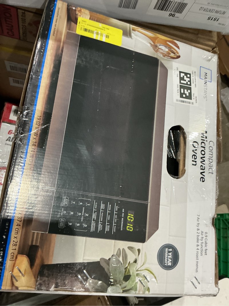 Condition photo showing As Is for mainstays 0.9 cu ft 3-in-1 air fry convection microwave oven, 900 watts