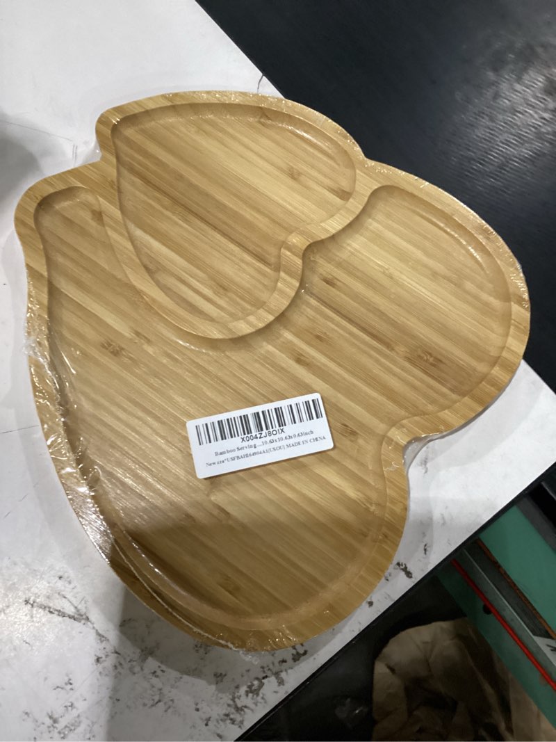 Condition photo showing New/Like New for bamboo heart serving platter
