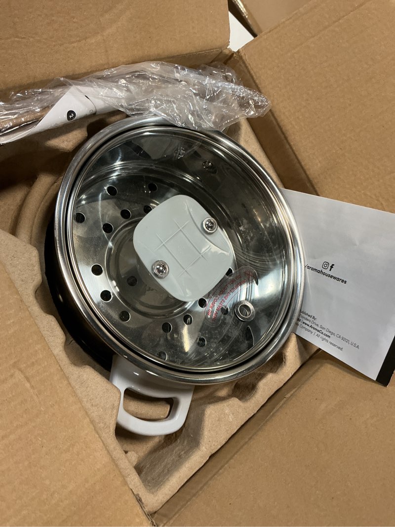 Condition photo showing As Is for Aroma Housewares 6-Cup (Cooked yield ) / 1.2Qt. Select Stainless Pot-Style Rice Cooker, & Food Steamer, One-Touch Operation, White