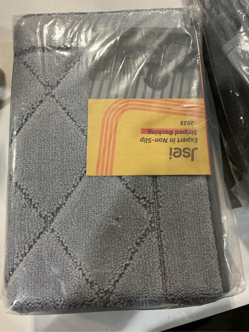 Condition photo showing New/Like New for jsei non-slip bathroom rugs, self adhesive no sliding bath rugs set of 2, machine washable absorbent bath mat set for tub shower & single sink 20”x32”+20”x48”, light grey, diamond pattern light grey 20''x32''+20''x48''(diamond pattern)