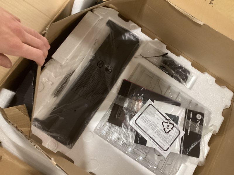 Condition photo showing As Is for GE Profile™ Smart Indoor Pellet Smoker, with Active Smoke Filtration, 5 Smoke Control Settings, WiFi Connected, Electric, Countertop BBQ Appliance, Black NOT TESTED  INCOMPLETE 