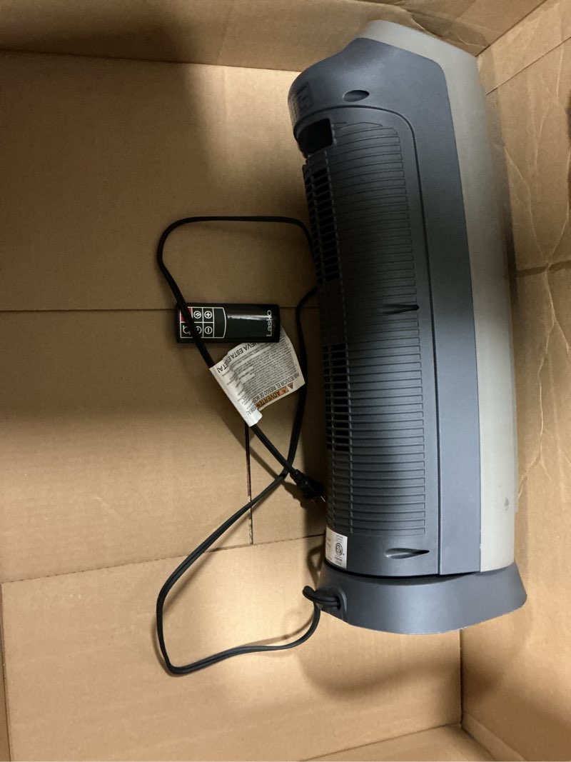 Condition photo showing As Is for Lasko Oscillating Digital Ceramic Tower Heater for Home with Adjustable Thermostat, Timer and Remote