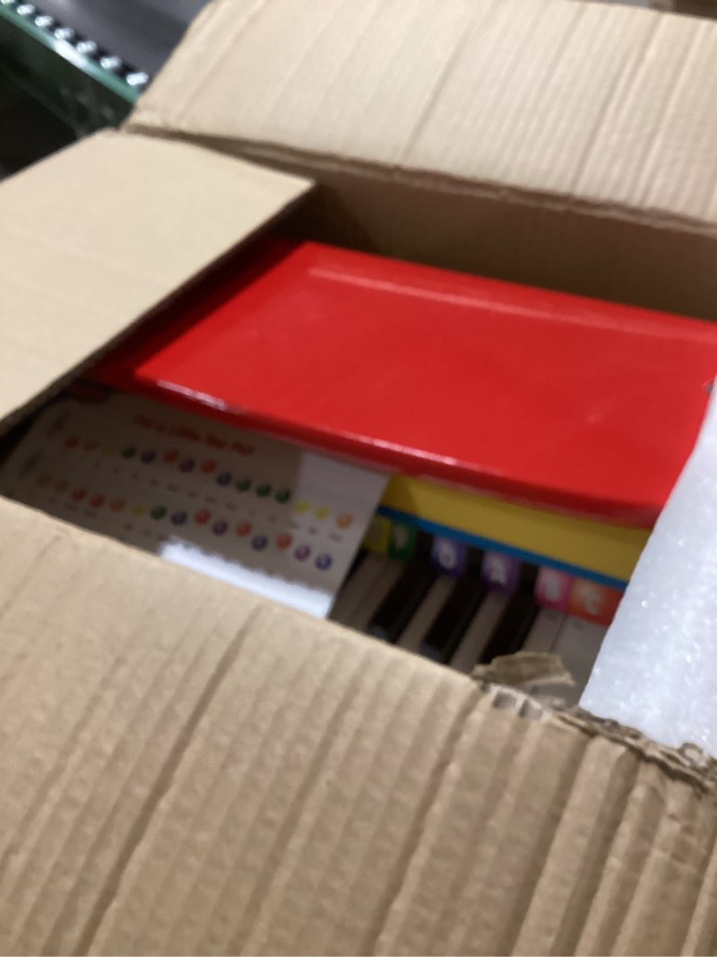 Condition photo showing Good Condition for Melissa & Doug Learn-to-Play Piano with 25 Keys and Color-Coded Songbook Toy Piano Kids, Toddler Toys for Ages 3+