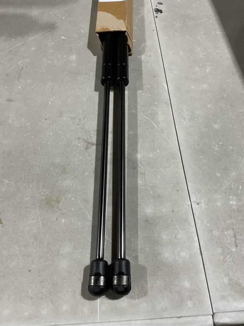 Condition photo showing As Is for auceramic rear trunk hatch lift supports fit for nissan model - rogue sport only 2017 2018 2019 2020 2021 replace# 904506ma0a, 904516ma0a, 612320 (2-pc set)