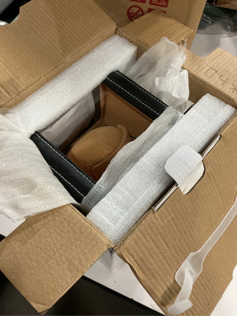 Condition photo showing Good Condition for automatic single watch winder for rolex and other luxury watches - automatic winder with quiet motor, premium black ostrich leather exterior and soft flexible watch pillows of camel velvet