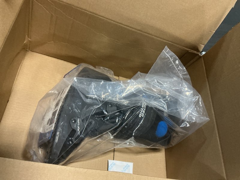 Condition photo showing New/Like New for united ortho short air cam walker fracture boot, small, black black small boot