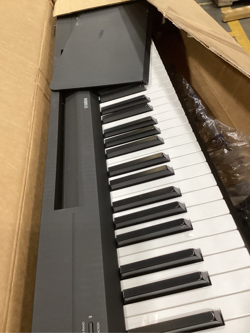 Condition photo showing As Is for yamaha 88-key digital piano with weighted keys, compact design, bluetooth, keyboard, music rest, sustain foot switch, and built-in speakers for home practice or travel p145bt p145bt black