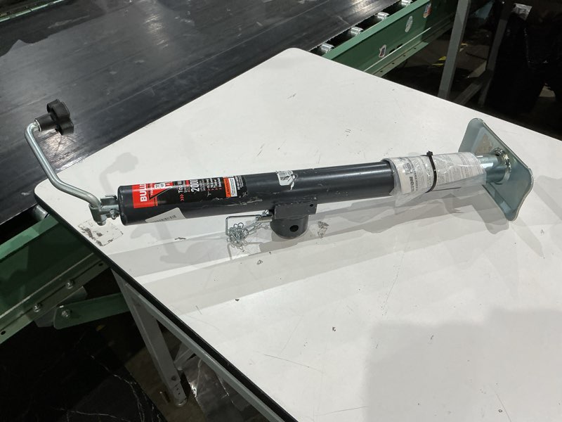 Condition photo showing As Is for bulldog 2,000 lb. capacity side-mounted side wind round weld-on trailer jack, 10 in. travel