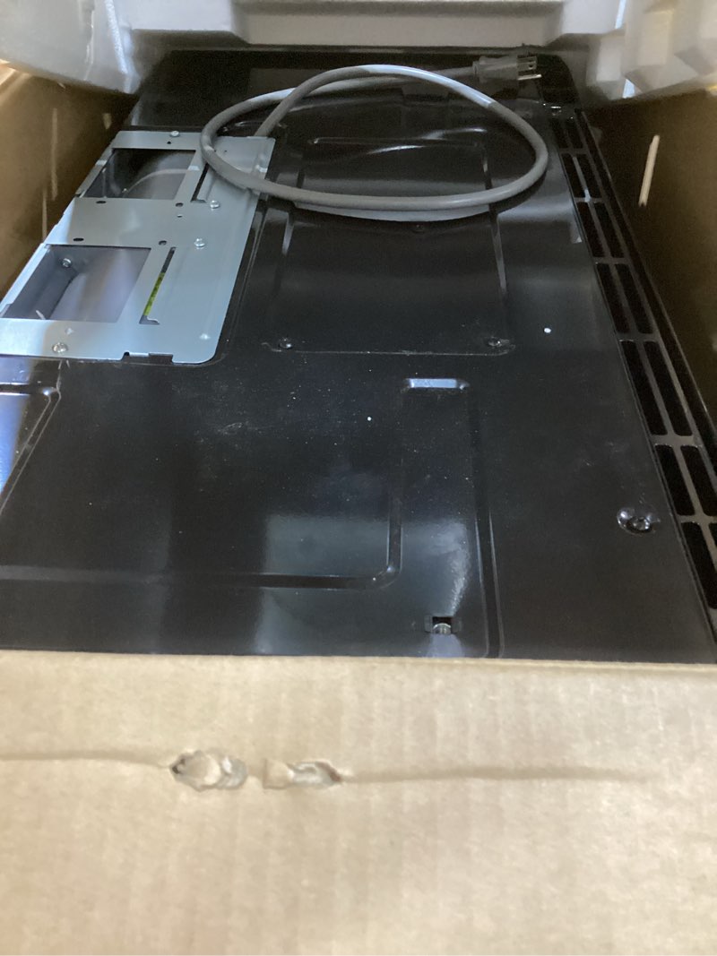 Condition photo showing As Is for black+decker over the range microwave oven with vent and one-touch auto cooking, 1.7 cu. ft. otr over stove microwave, black, 1000 watts, em044k6cf-bk 1.7 cu.ft black