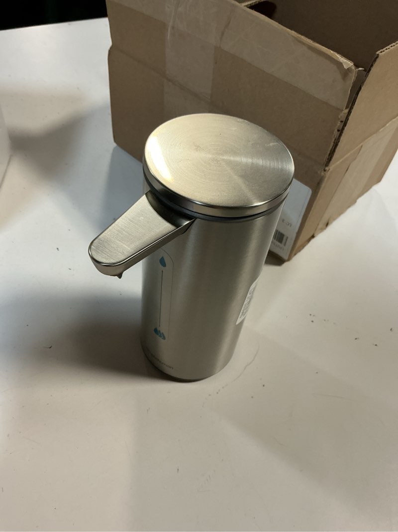 Condition photo showing As Is for simplehuman 9 oz. touch-free rechargeable sensor liquid soap pump dispenser, brushed stainless steel