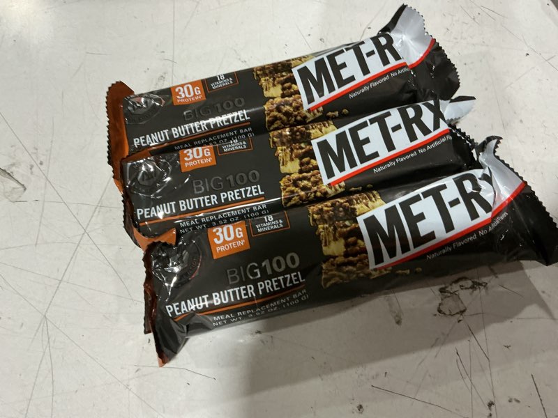 Condition photo showing As Is for (bb: 10/02/2026) met-rx big 100 high protein meal replacement bars, peanut butter pretzel, 30g protein, 3.52 oz, 4 count