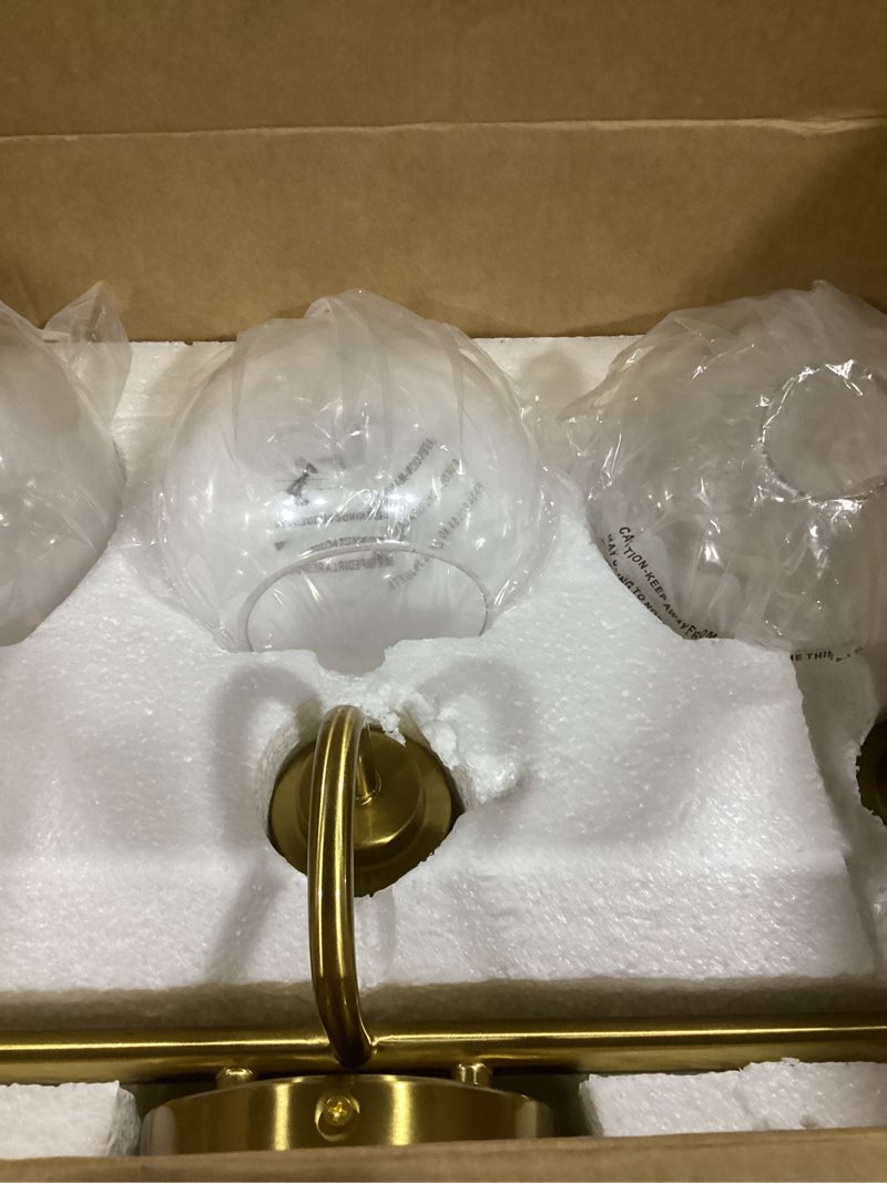 Condition photo showing Good Condition for Bathroom Light Fixtures, 3-Light Brushed Gold Vanity Lights with Globe Clear Glass, Champagne Bronze Vanity Lighting Fixtures Over Mirror, AD-22280-3W-GD Gold, 3-Light