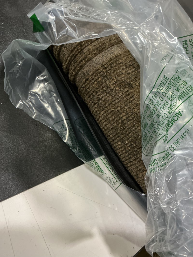 Condition photo showing Good Condition for (similar color)buganda front door mat indoor outdoor entrance, non-slip natural rubber doormats, easy clean, low profile, dirt trapper entryway floor mats for outside, garages and patios, 29.5x17, beige 29.5\" x 17\" beige