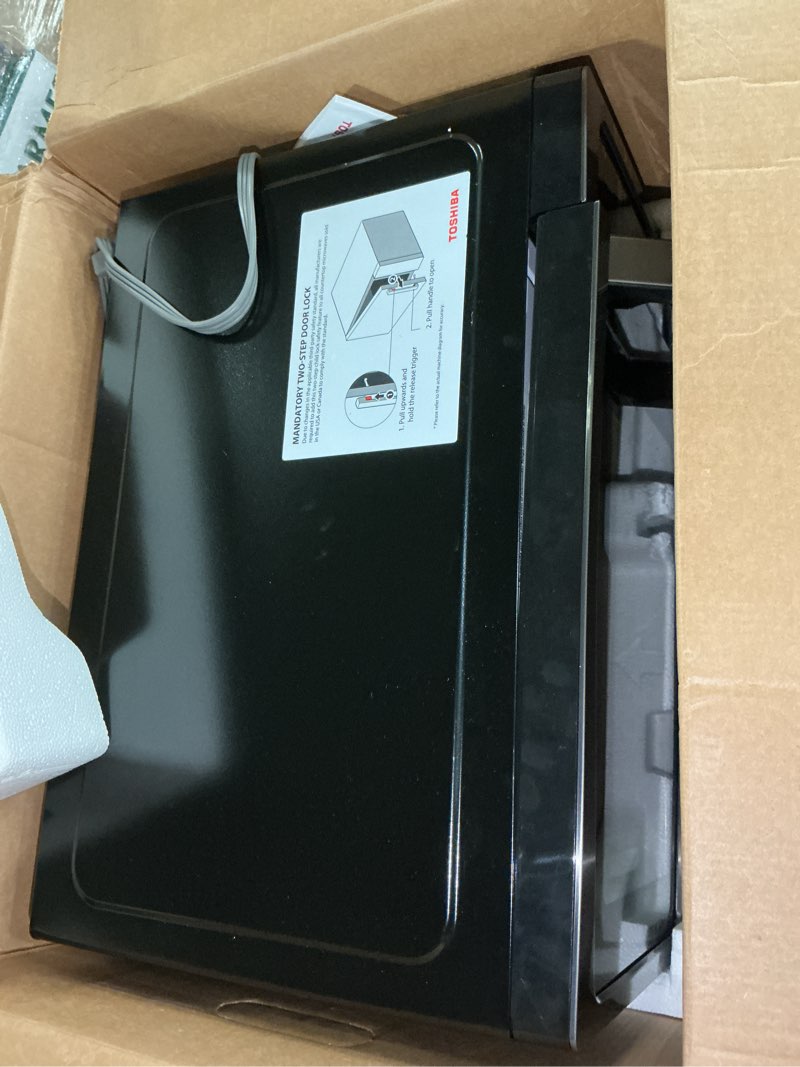 Condition photo showing As Is for TOSHIBA ML-EM09PA(BS) Small Microwave Oven with 6 Auto Menus, Mute Function & Child Lock, LED Lighting, 0.9 Cu Ft, 10.6 Inch Removable Turntable, 900W, Countertop, Black Stainless Steel Advanced-0.9 Cu Ft-900W-Black Stainless Steel