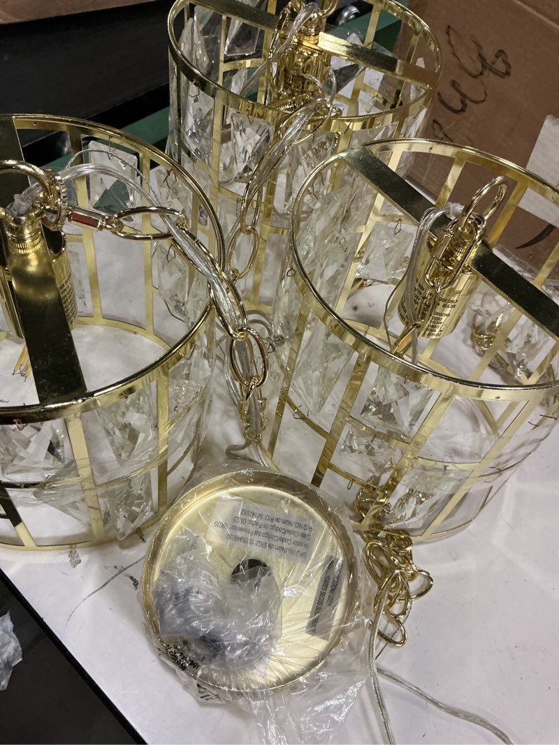 Condition photo showing As Is for modern gold crystal pendant light fixture adjustable heigh
