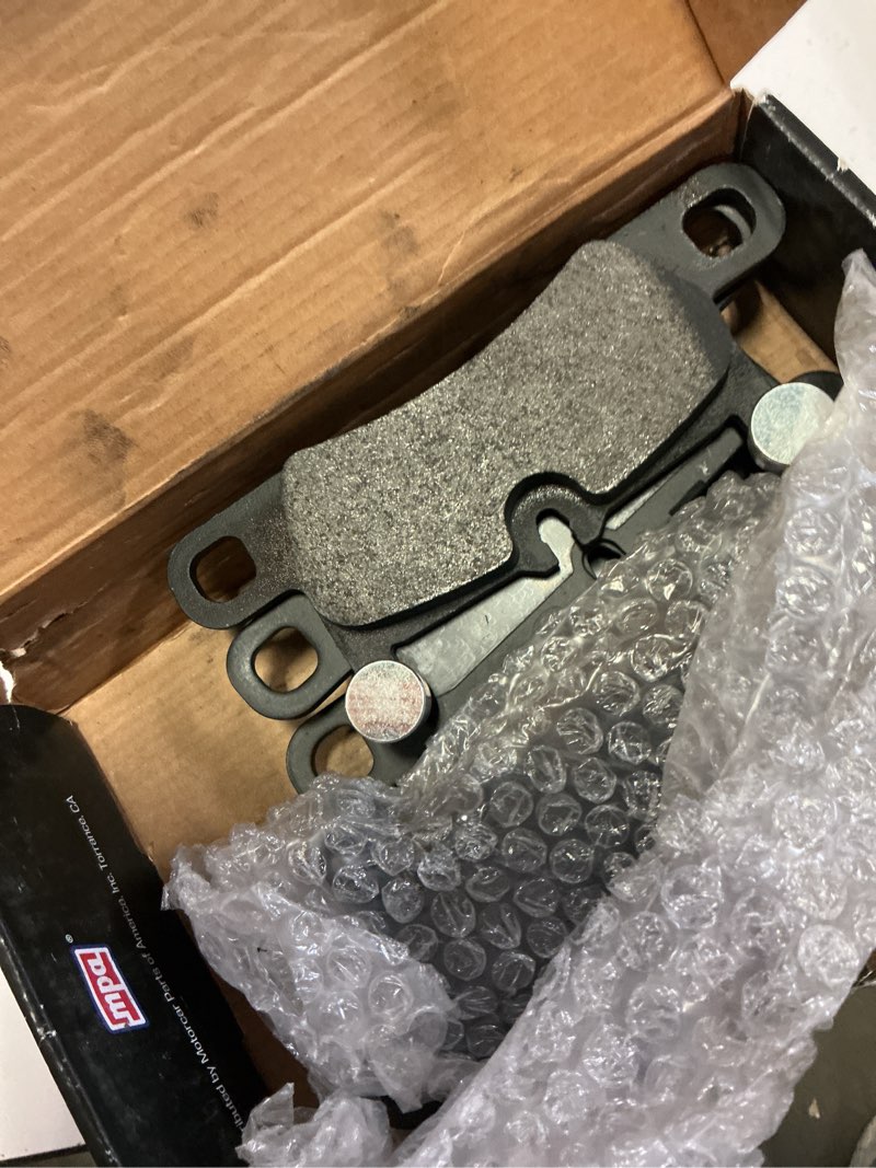 Condition photo showing As Is for black series semi-metallic rear brake pads (1003-1655m) compatible with porsche 911 2015-2016, porsche boxster 2016-2016, porsche cayenne 2019-2020 semi-metallic bp1655