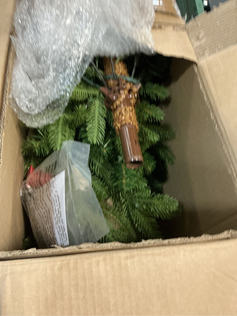 Condition photo showing New/Like New for National Tree Company 'Feel Real' Pre-lit Artificial Christmas Tree | Includes Pre-strung White Lights and Stand | Norwegian Spruce - 7.5 ft 7ft 7in