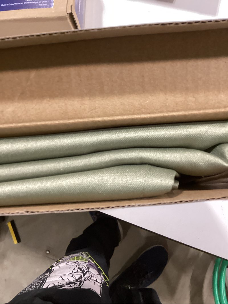 Condition photo showing Good Condition for Sun Zero 84-in Sage Green Room darkening Rod pocket Single curtain pane