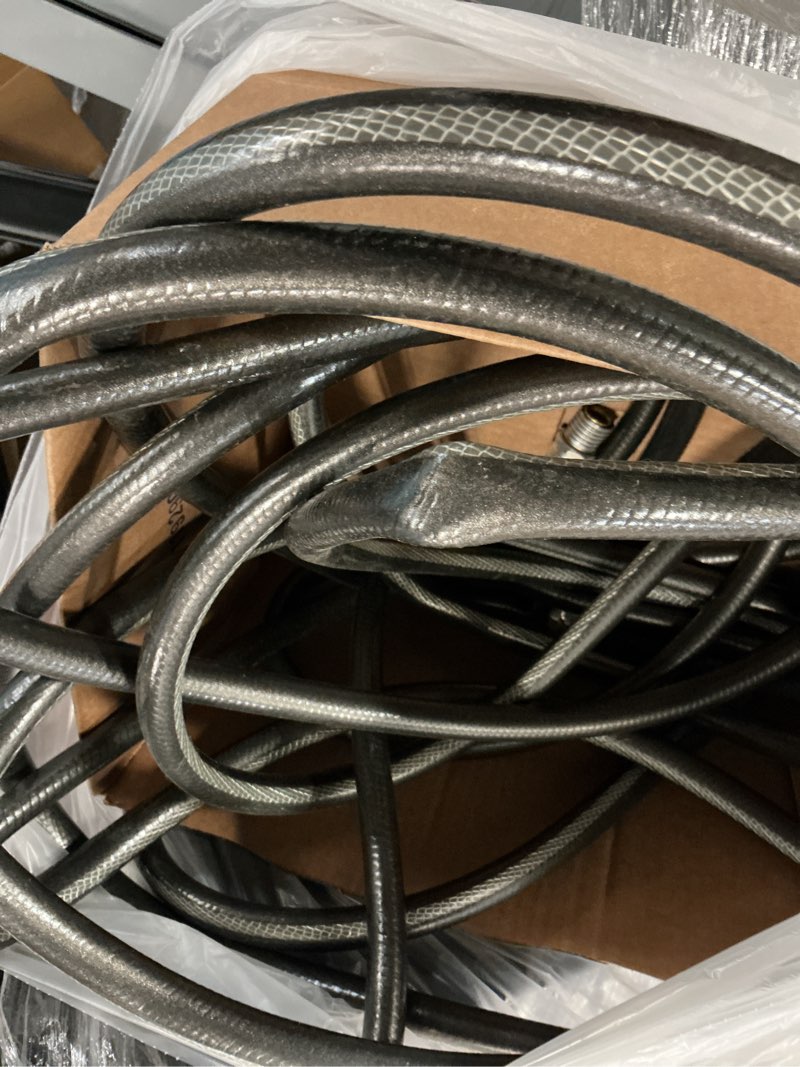 Condition photo showing As Is for neverkink teknor apex 5/8-in x 50-ft heavy -duty kink free vinyl gray coiled hose