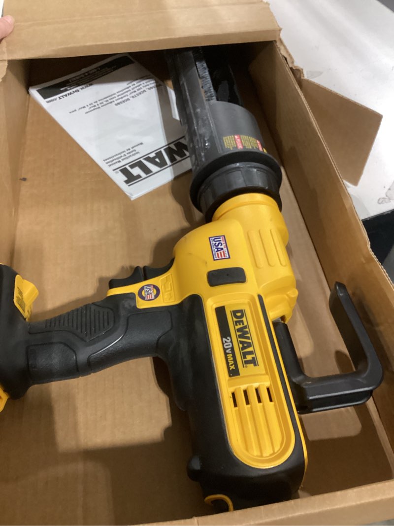 Condition photo showing As Is for dewalt 20v max* cordless caulking gun, 29oz, tool only (dce570b)