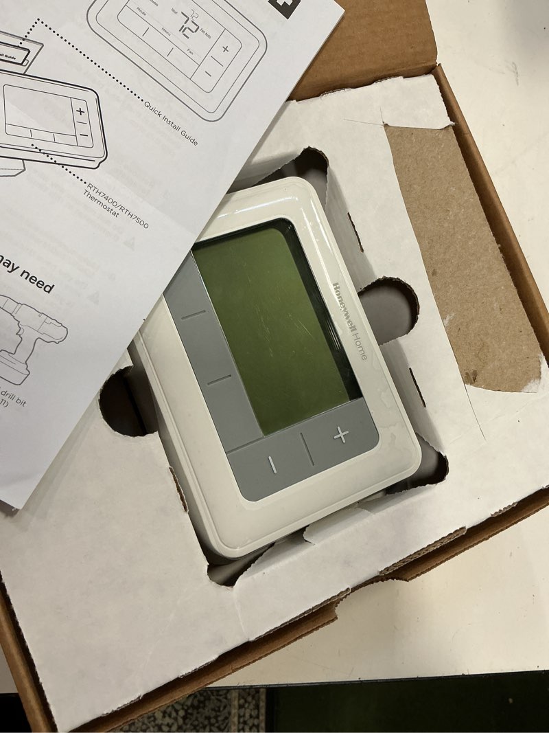 Condition photo showing As Is for Honeywell RTH7560E1001 Gray/White 7-Day Programmable Thermostat